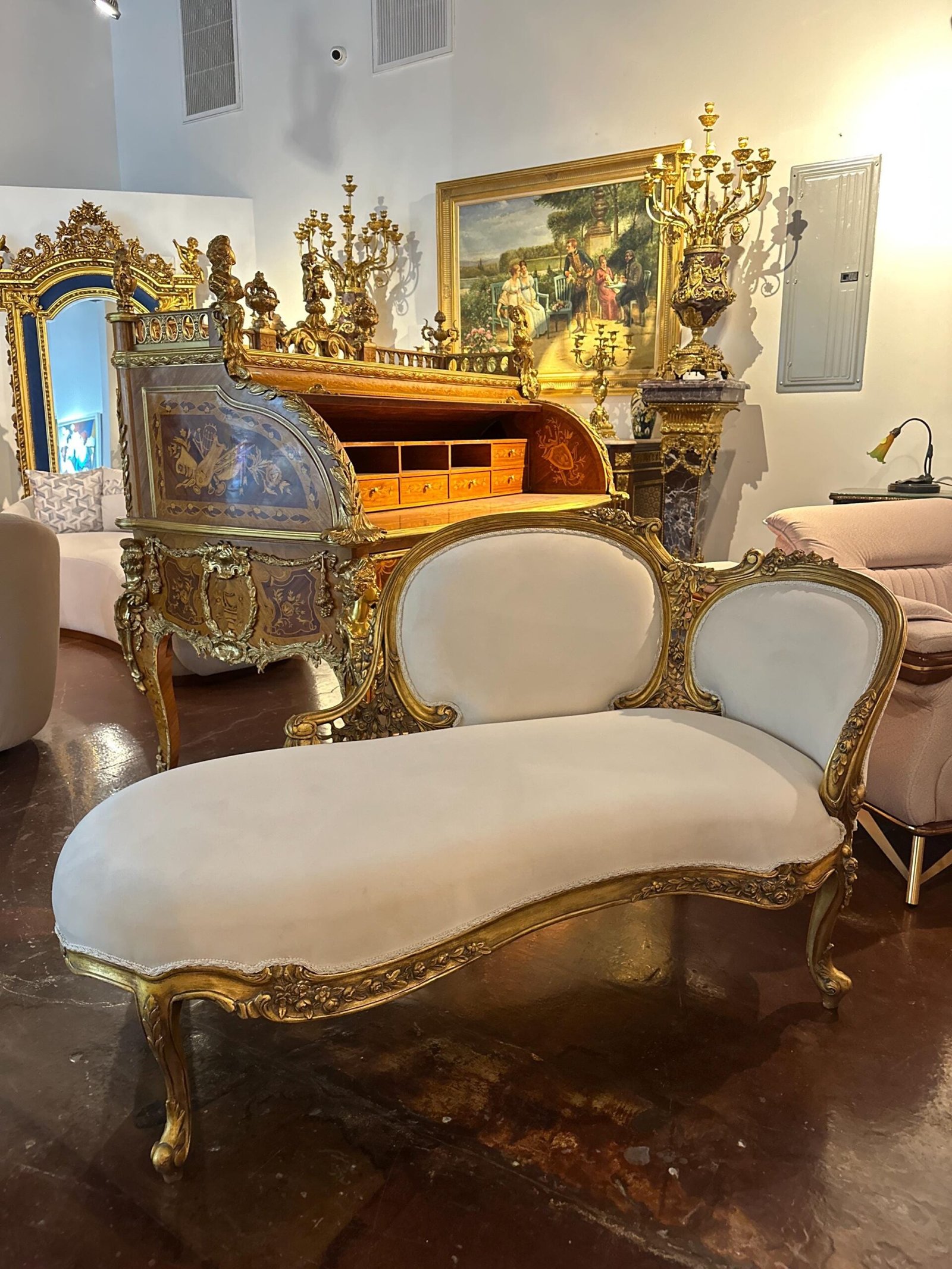 Louis XV French style chaise lounge in gold leaf